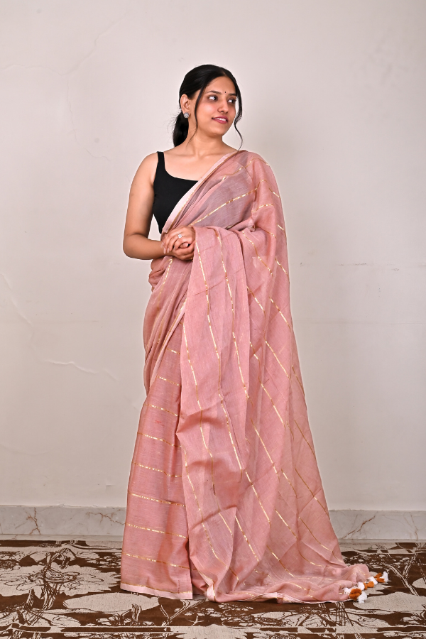 Peach beige mul cotton saree with zari work