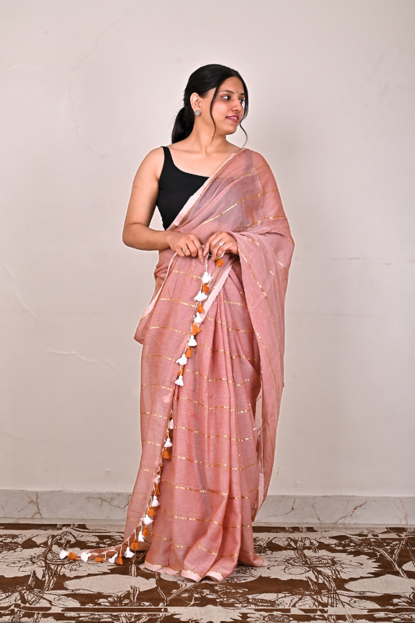 Peach beige mul cotton saree with zari work